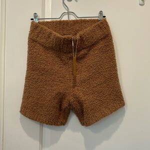 Skims cozy knit shorts brown color